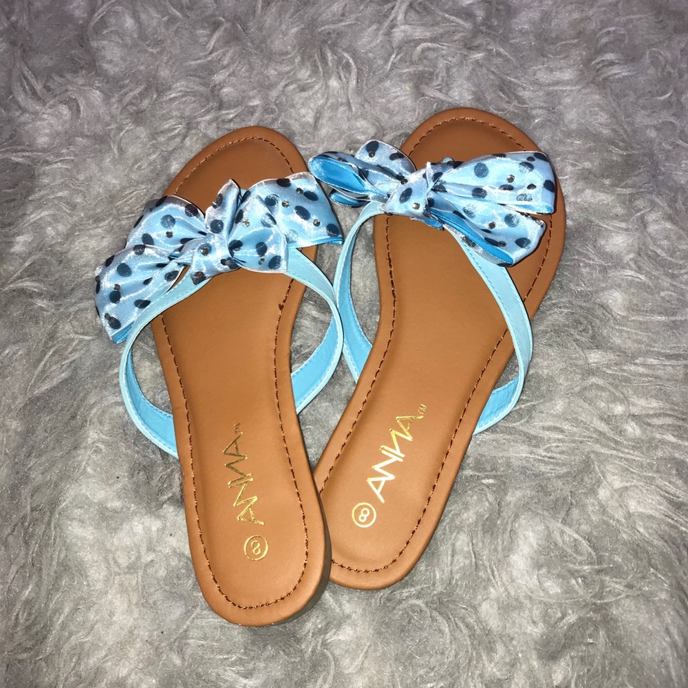 Blue and black sandals